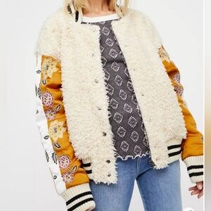 Free people Dandelion Furry Varsity Jacket size medium.
